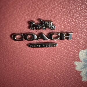 NEW no tags, Coach Floral Canvas-Leather Wristlet.